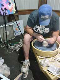 Mike Habzansky throwing Friday night at the Mooreland Free Fair.